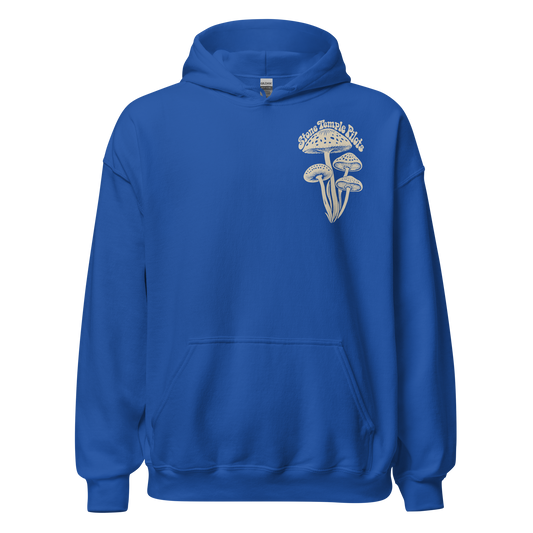A royal blue pullover hoodie with a white graphic on the left chest depicting mushrooms under a mushroom cap, with the text 'Stone Temple Pilots arched above them.