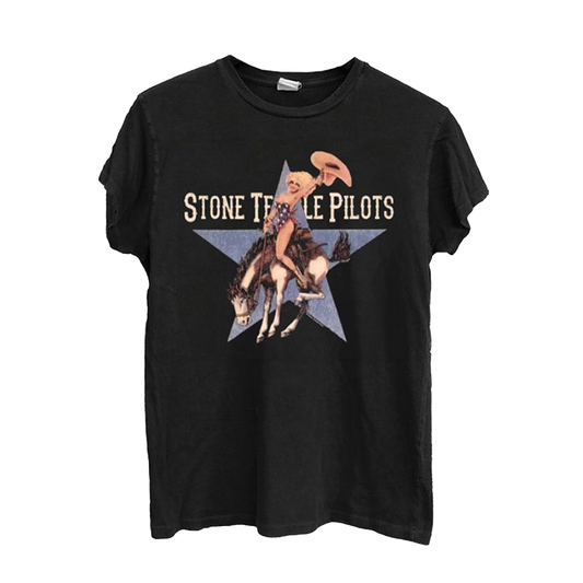 A black cotton short sleeve tee with Stone Temple Pilots logo and cowgirl riding a bronco artwork across the front.